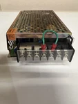 Cosel R100U-15 Enclosed Industrial Power Supply 15V 7A AC100-120V Silver Used. Price: $60.00.